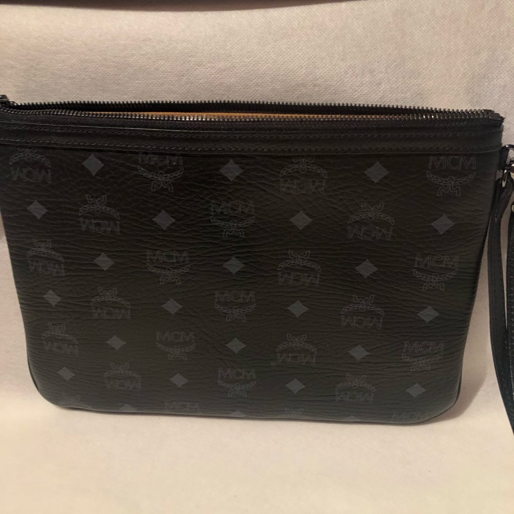 Gorgeous MCM black leather trimmed visetos  zippered pouch/ wristlet.
